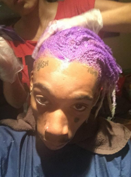 wiz khalifa has dyed his hair purple, we repeat, purple.